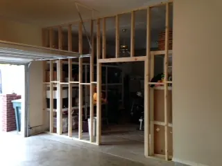 Wood stud framing for a new interior wall