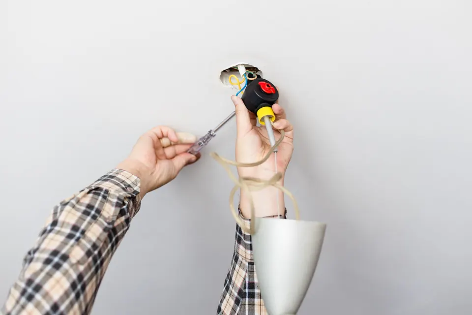 Hand wiring a light fixture